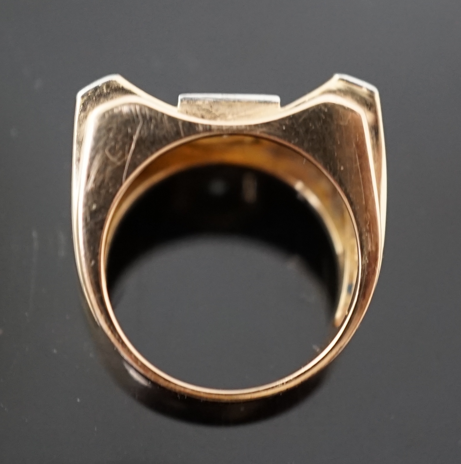 A 1940's 18ct gold and four stone diamond set 'tank' dress ring